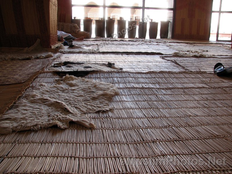 The floor of the Ben Youssef Mosque with its straw mats and lamb skin